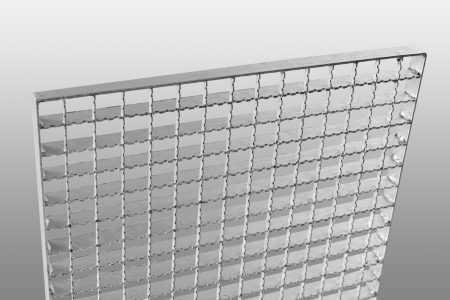 Close-up of a metal grate panel featuring a uniform grid pattern, highlighting its design and texture.