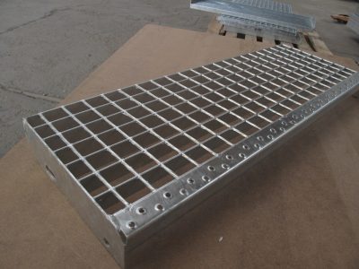 metal grate on a wooden surface